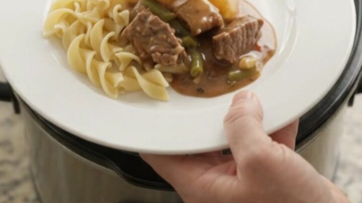 Slow cooker beef tenderloin tips with green beans and potatoes in sour cream gravy