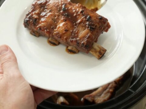 Slow-cooker baby back ribs glazed with molasses garlic sauce