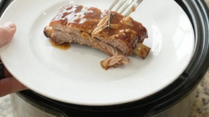 Tender slow-cooker spare ribs glazed with honey-hickory BBQ sauce