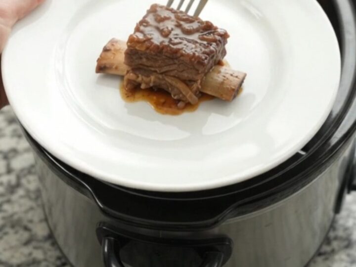 Slow cooker beef short ribs glazed with brown sugar molasses sauce