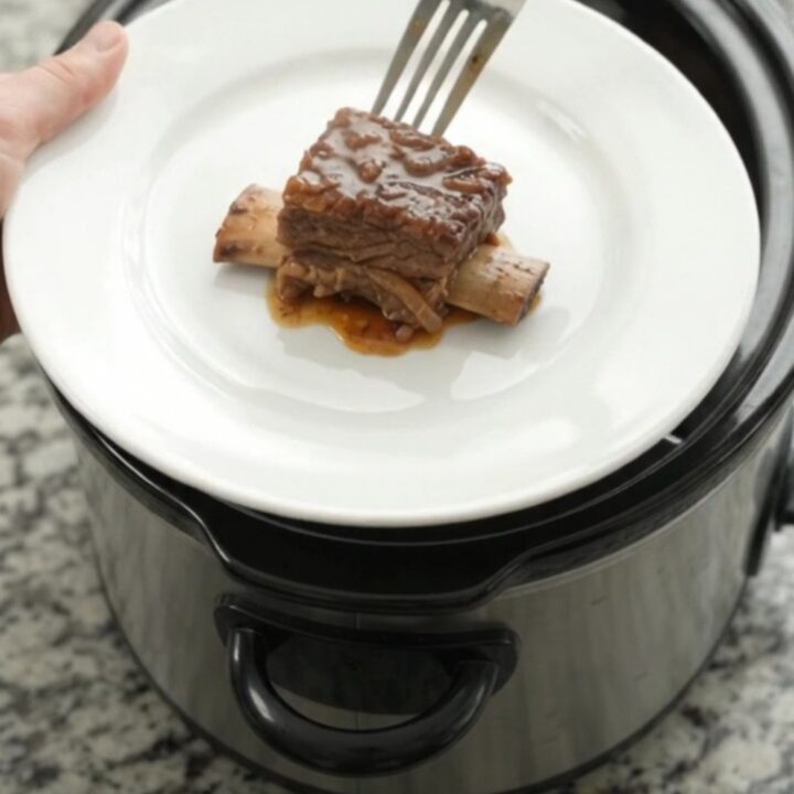 Slow cooker beef short ribs glazed with brown sugar molasses sauce