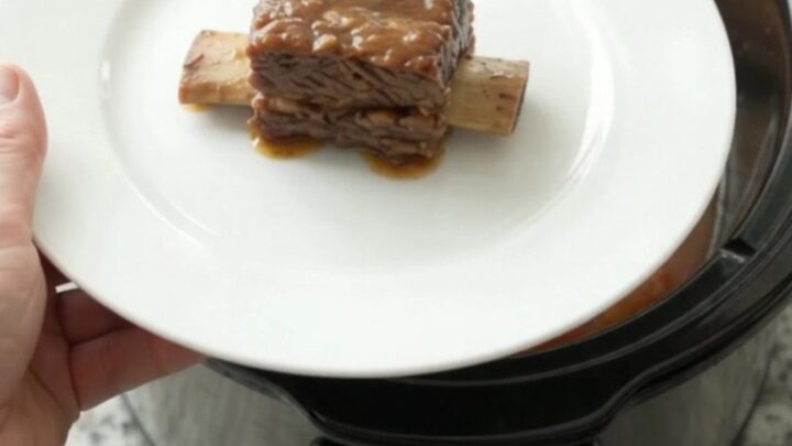 Slow cooker beef short ribs with apples in maple bourbon BBQ sauce