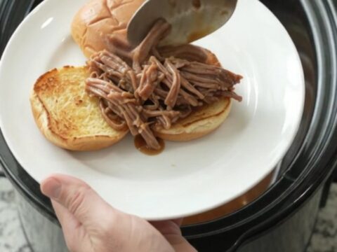 Slow-cooker beef brisket with pepperoncini and gravy, served on toasted brioche slider buns.