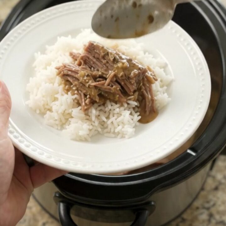 Fork-tender shredded beef brisket in a creamy Dijon gravy in a slow cooker