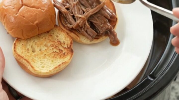 Shredded beef brisket with gravy on a toasted brioche slider bun