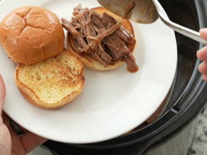 Shredded beef brisket with gravy on a toasted brioche slider bun