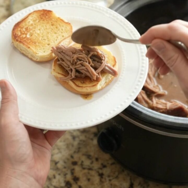 Slow-cooker pork sirloin roast with mushrooms in a glossy brown gravy