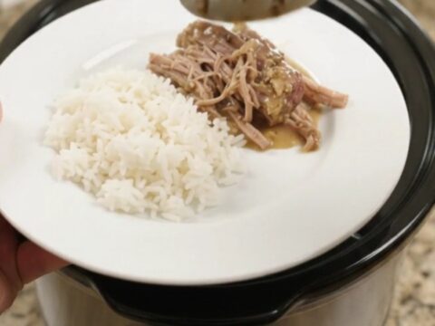 Shredded pork sirloin roast in a creamy Dijon sauce in a slow cooker