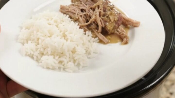 Shredded pork sirloin roast in a creamy Dijon sauce in a slow cooker