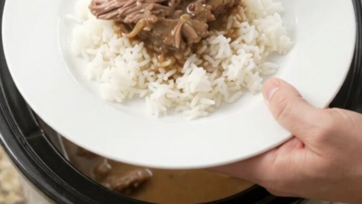 Slow cooker beef bottom round roast with pearl onions and creamy Guinness Dijon gravy