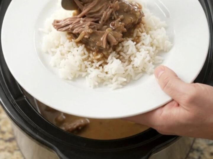 Slow cooker beef bottom round roast with pearl onions and creamy Guinness Dijon gravy