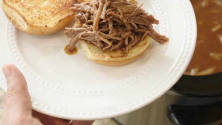 Slow cooker French onion brown gravy bottom round roast with caramelized onions and rich gravy