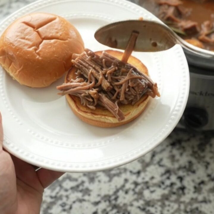 Slow-cooker bottom round roast with garlic and herbs in rich brown gravy