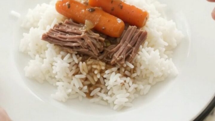 Slow-cooked beef bottom round roast with shallots and carrots in a creamy Dijon gravy in a Crockpot