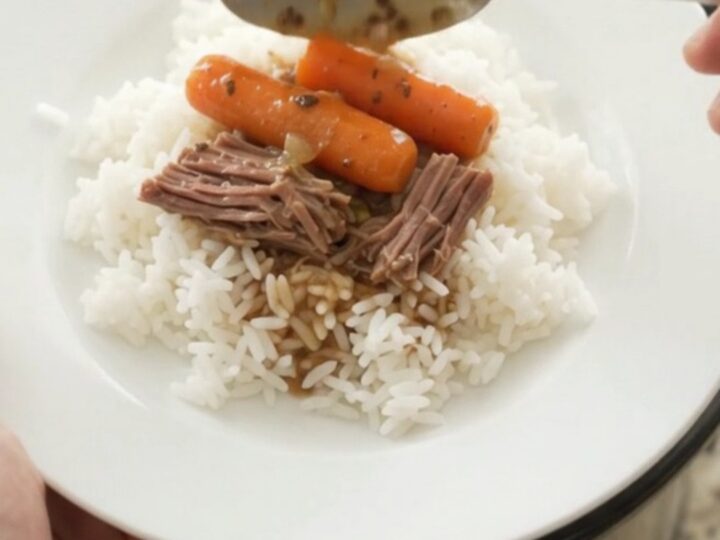 Slow-cooked beef bottom round roast with shallots and carrots in a creamy Dijon gravy in a Crockpot