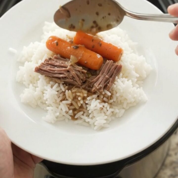 Slow-cooked beef bottom round roast with shallots and carrots in a creamy Dijon gravy in a Crockpot