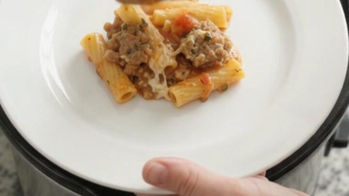 Bubbling Crockpot baked ziti with melted provolone and ricotta