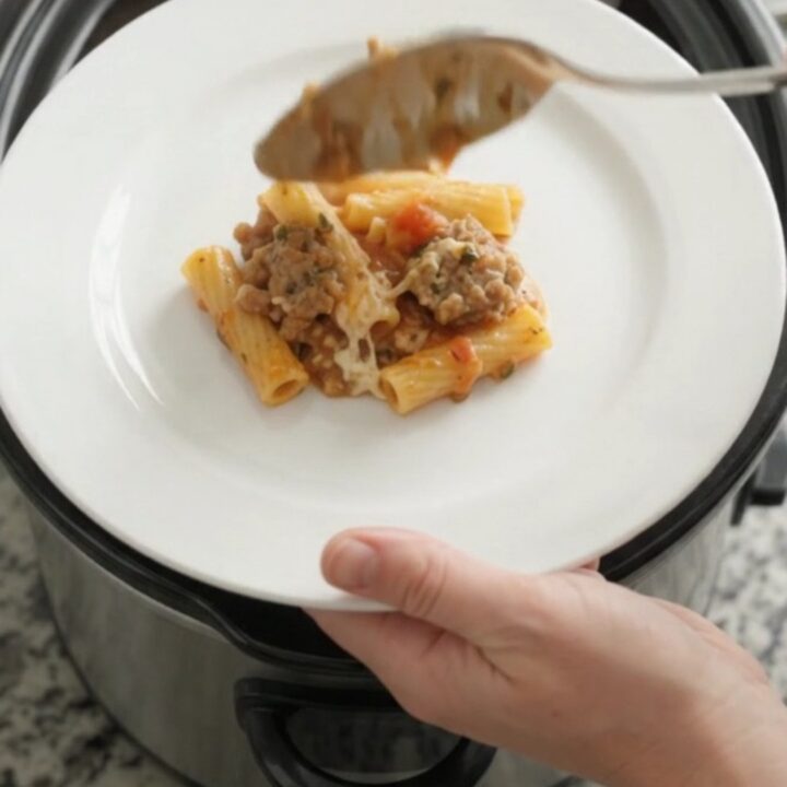 Bubbling Crockpot baked ziti with melted provolone and ricotta