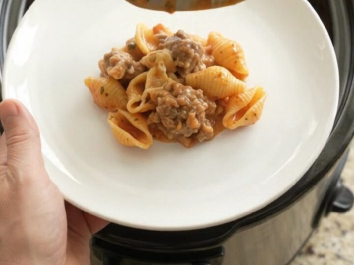 Bubbling Crockpot Boursin Sausage Pasta Shells with melted cheese