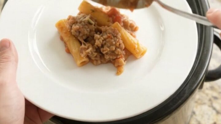 Crockpot Boursin sausage baked ziti with melted cheese and herbs