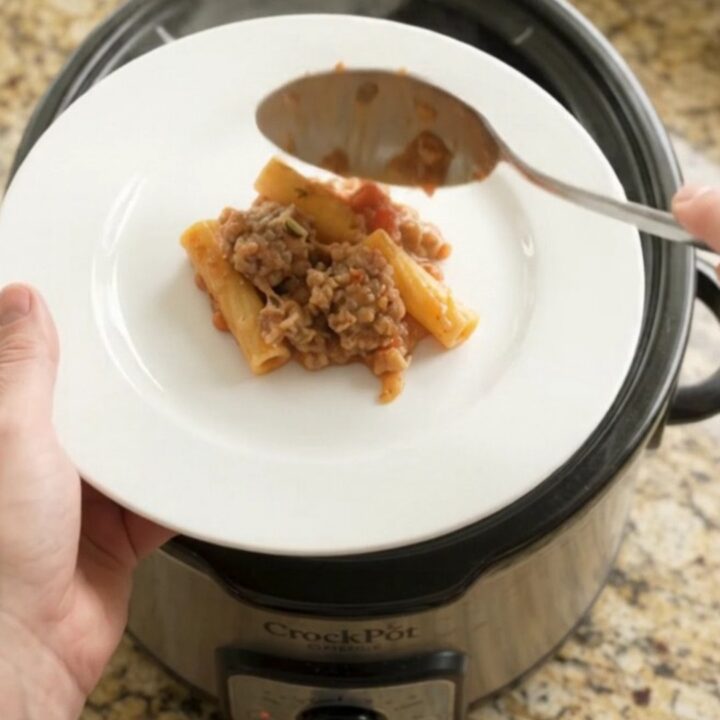 Crockpot Boursin sausage baked ziti with melted cheese and herbs