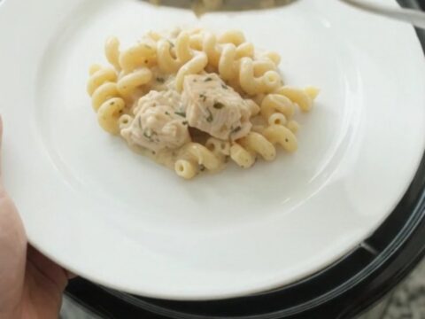Creamy Crockpot chicken cavatappi with Boursin and fontina, served in a black slow cooker