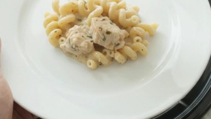 Creamy Crockpot chicken cavatappi with Boursin and fontina, served in a black slow cooker