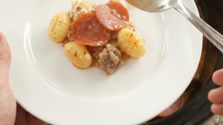 Bubbling Crockpot gnocchi with pepperoni, sausage, and melted provolone