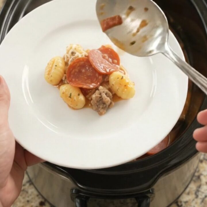 Bubbling Crockpot gnocchi with pepperoni, sausage, and melted provolone