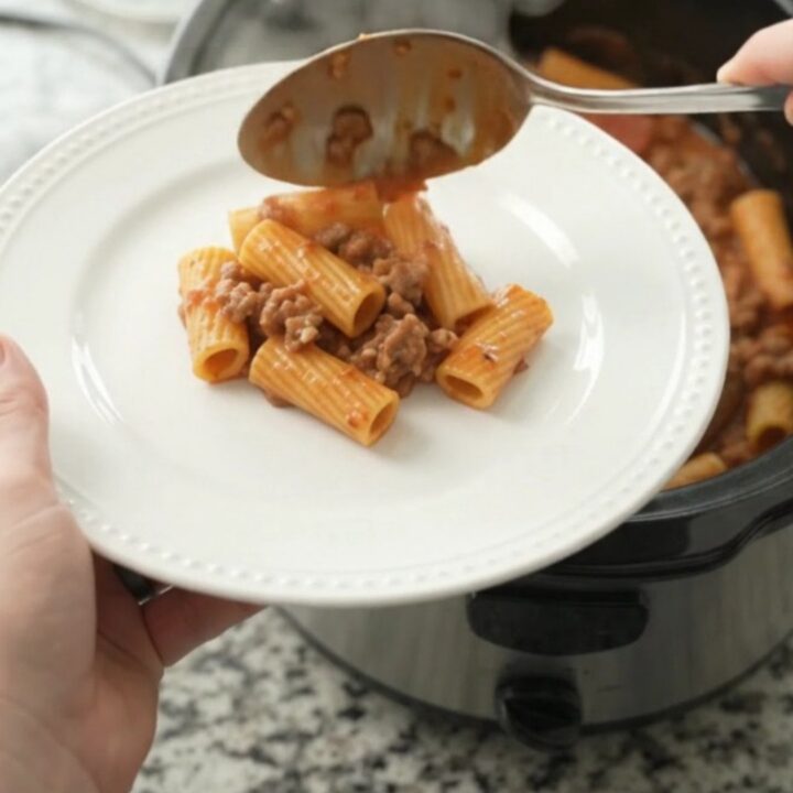 Bubbling Crockpot rigatoni with melted cheese and pepperoni