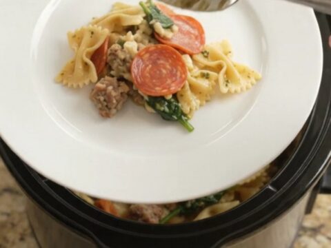 Bubbling slow cooker pasta with melted mozzarella and pepperoni