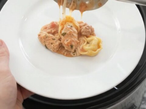 Crockpot Boursin Chicken Marinara Tortellini in a slow cooker, creamy sauce with chicken and tortellini