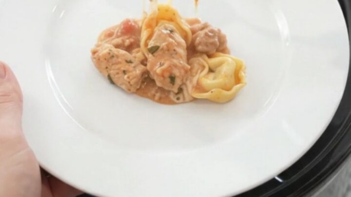 Crockpot Boursin Chicken Marinara Tortellini in a slow cooker, creamy sauce with chicken and tortellini