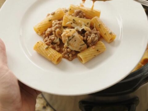 Crockpot Provolone Chicken Bolognese Rigatoni with melting cheese and tender chicken in a slow cooker