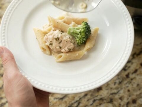 Creamy Crockpot Boursin chicken Alfredo penne with broccoli and melted fontina in a slow cooker