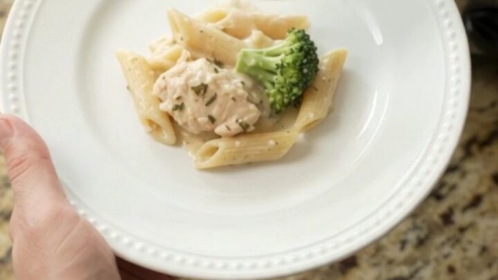 Creamy Crockpot Boursin chicken Alfredo penne with broccoli and melted fontina in a slow cooker