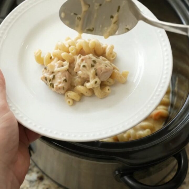 Creamy Crockpot chicken cavatappi with melted cheese and golden top