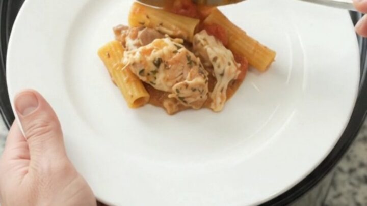 Bubbling Crockpot Provolone Garlic Chicken Baked Ziti with melted cheese on top
