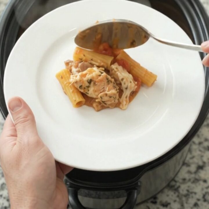 Bubbling Crockpot Provolone Garlic Chicken Baked Ziti with melted cheese on top