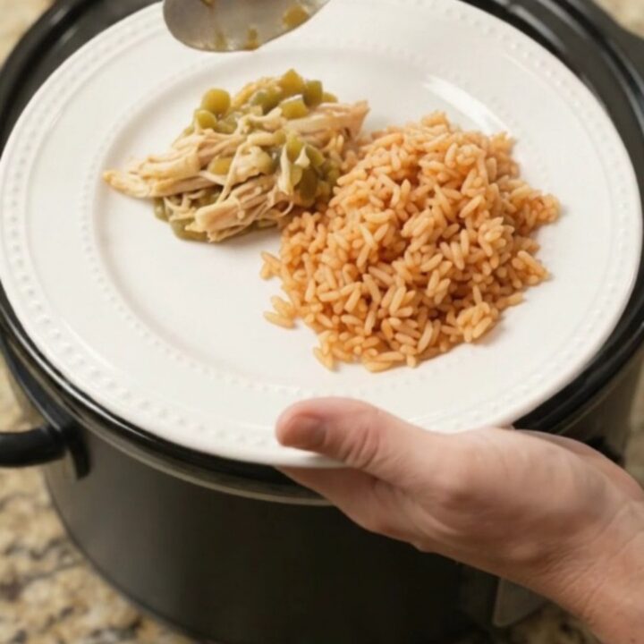 Slow cooker salsa verde chicken with melted Oaxaca cheese, served over Spanish rice