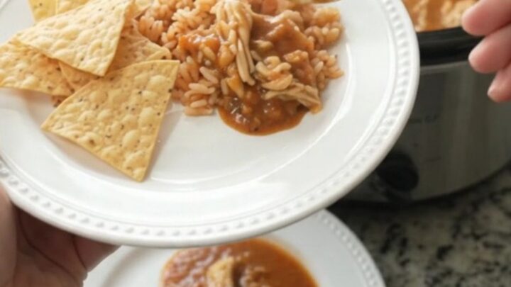 Shredded chicken in a creamy chipotle pineapple sauce with melted pepper jack, served in a slow cooker.