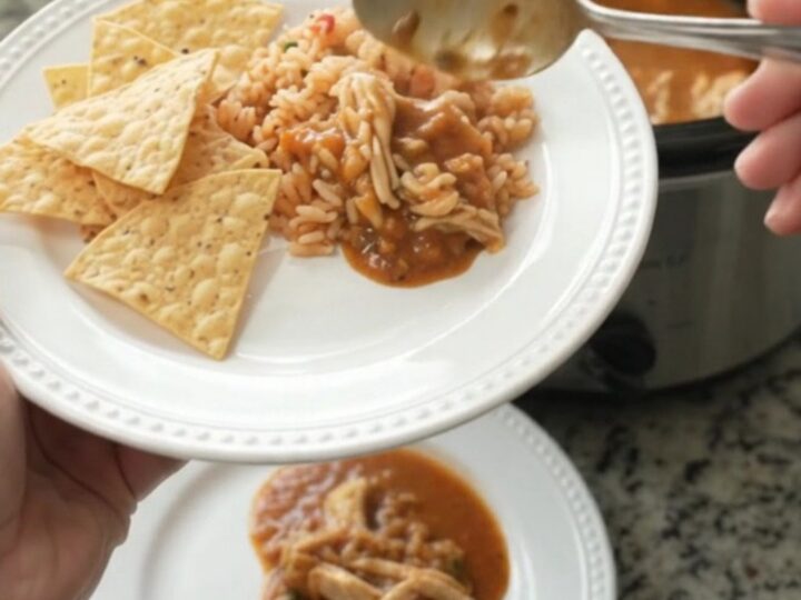 Shredded chicken in a creamy chipotle pineapple sauce with melted pepper jack, served in a slow cooker.