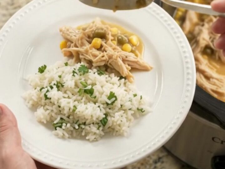 Creamy crockpot chicken with cheese and corn in a slow cooker