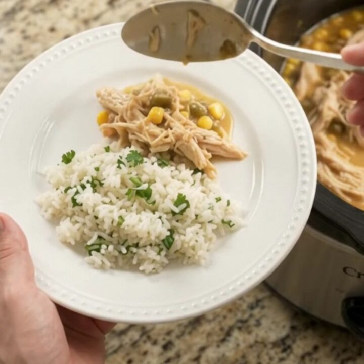 Creamy crockpot chicken with cheese and corn in a slow cooker