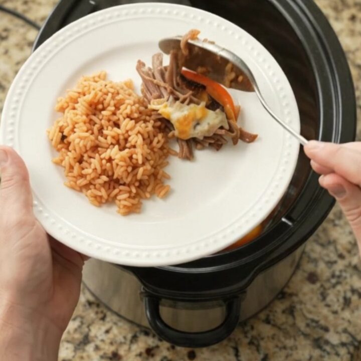 Slow-cooker Oaxaca queso fajita beef barbacoa with melted cheese and peppers