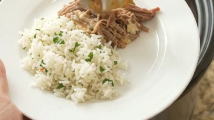 Crockpot Cheddar Rotel Jalapeño Beef Barbacoa in the slow cooker, with creamy sauce and shredded beef