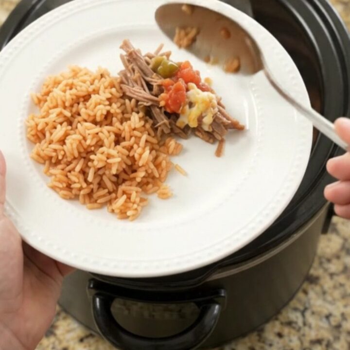 Slow cooker beef barbacoa with melted Oaxaca cheese and jalapeños