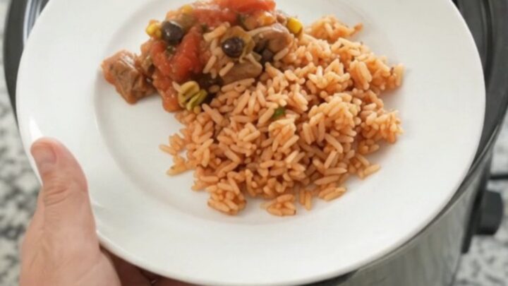 Slow cooker pork carnitas with melted Oaxaca cheese and black beans