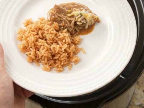 Slow-cooker pork carnitas with melted Oaxaca cheese and green chiles