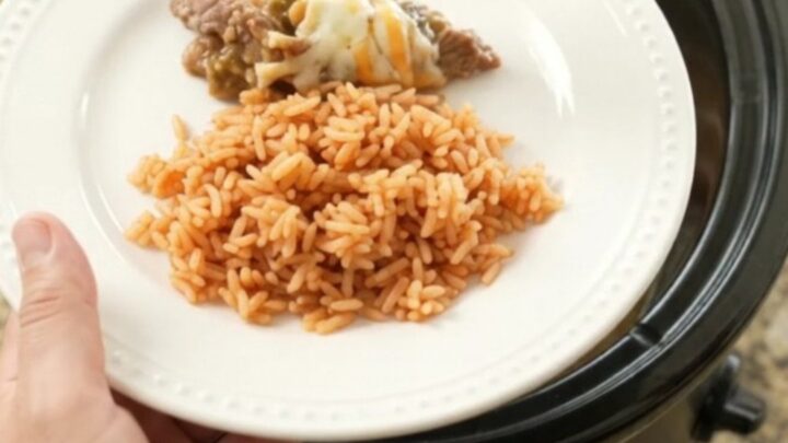 Slow-cooker skirt steak with salsa verde and melted Oaxaca cheese, bubbling in the crockpot
